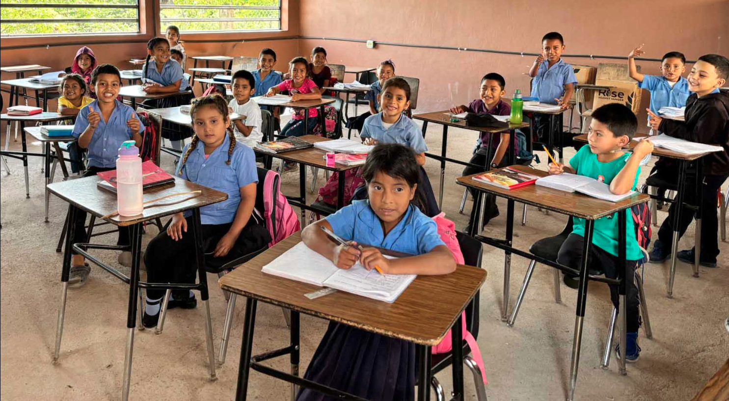 Group of women packing brown bags