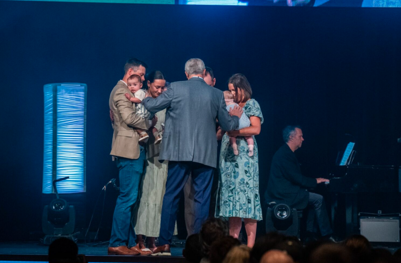 Group of people smiling and talking
