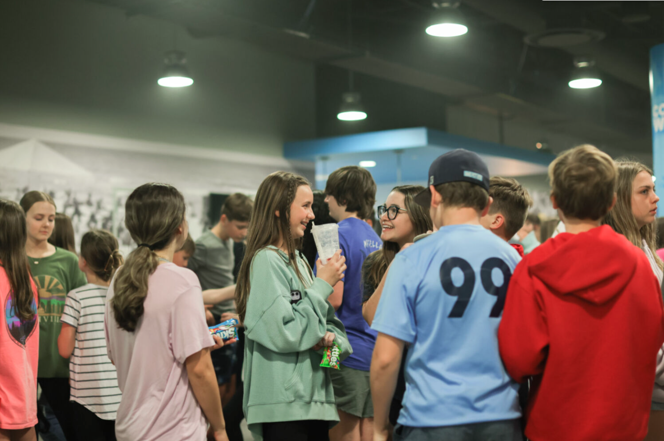 Young people sitting at a table studying